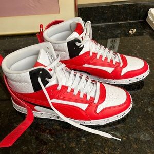 Puma Men's size 11 red, black and white great condition